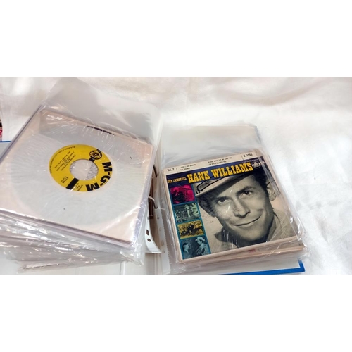 468 - Folder full of Hank Williams 45's Yellow MGM