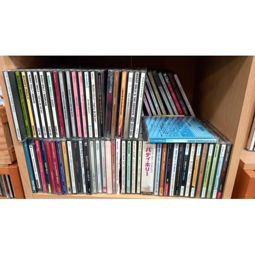 511 - All the Buddy Holly CD's anyone could want, many still sealed