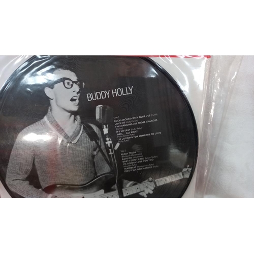 648 - Four Buddy Holly picture disc LP's.