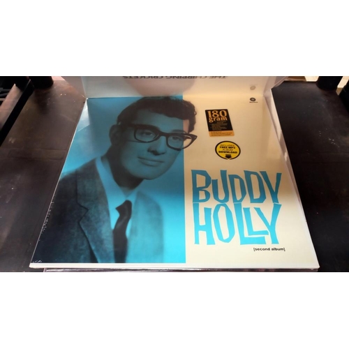 692 - 18 still sealed LP's by Buddy Holly + 2 opened , looked to be unplayed