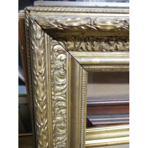 1350 - A good lot of gilt and wooden picture frames, some with glass some without glass, COLLECT ONLY.