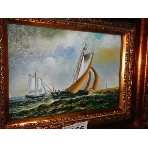 1366 - A gilt framed seascape featuring yachts, 30 x 25 cm.