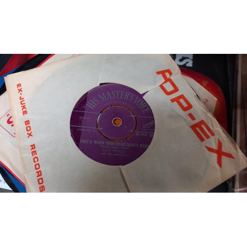 794 - Quantity of Elvis 45s + LPs, including rare cover Christmas album and some early press 45s