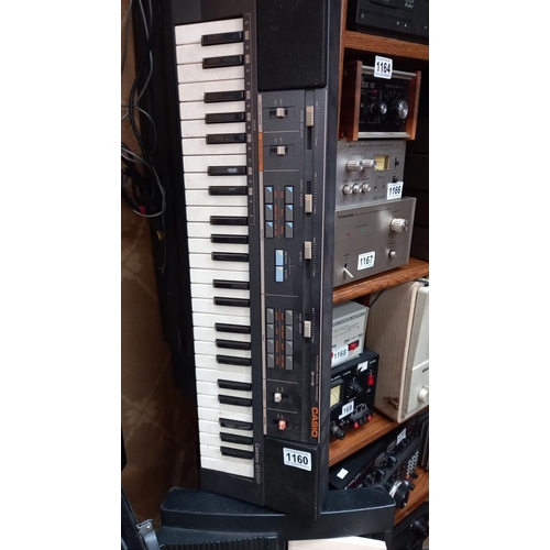 1160 - A Roland ''sound canvas'' 3 Yamaha and a Casio keyboard with stand