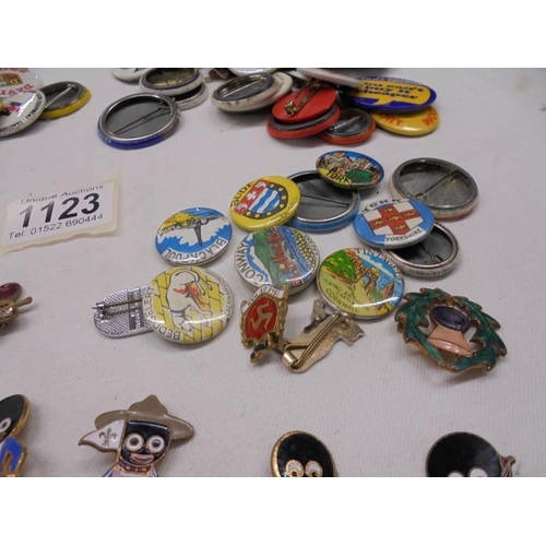 1123 - A mixed lot of badges including Robinsons, petrol. agricultural etc.,