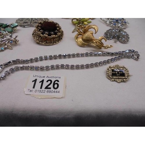 1126 - A mixed lot of good quality brooches, pearl necklaces etc.,