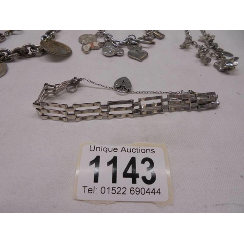 1143 - 3 charm bracelets - 1 with coins, 1 with 925 St. Christopher and a gate bracelet with 925 silver hea... 