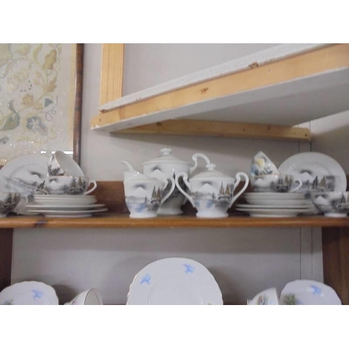 1308 - A Japanese porcelain tea set, a thatched cottage tea set and one other. COLLECT ONLY.