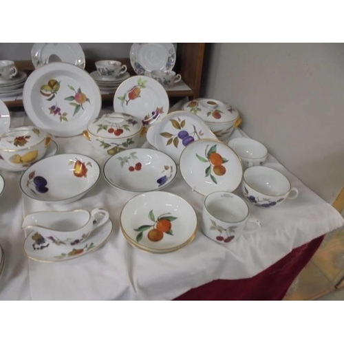 1309 - Approximately fifty pieces of Royal Worcester Evesham pattern table ware, COLLECT ONLY.