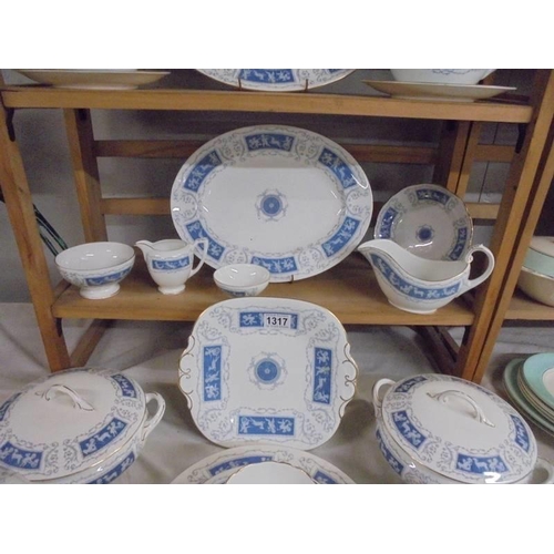 1317 - 54 pieces of Coalport 'Revelry' pattern tea and dinner ware, COLLECT ONLY.