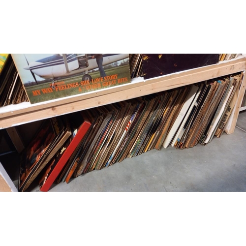 100 - A large quantity of LP records, various genres over 5 shelves COLLECT ONLY