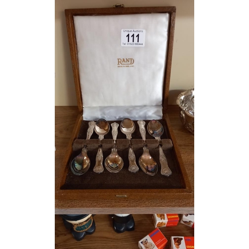 111 - A boxed set of 6 Kings pattern teaspoons, 2 sets of silver plate milk jug and sugar bowls and a silv... 