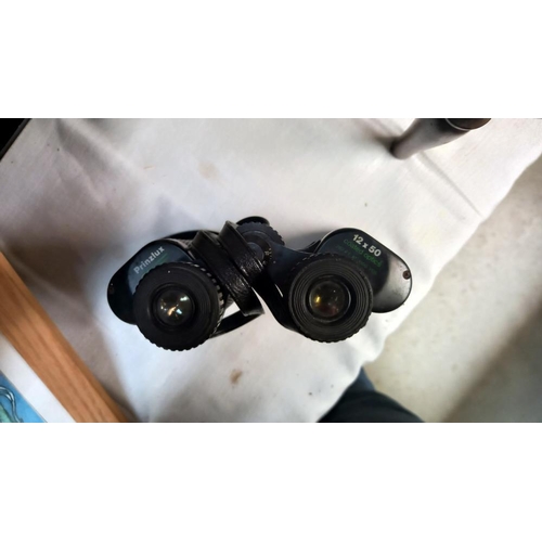 21 - A pair of Prinzlux 12 x 50 and a pair of Prinz 10 x 50 binoculars with cases