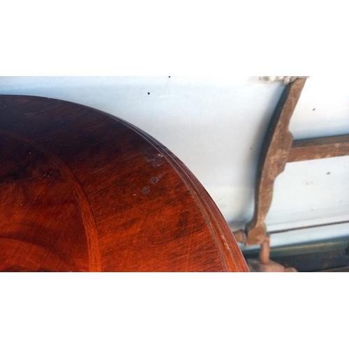 43 - A dark wood stained circular tripod table