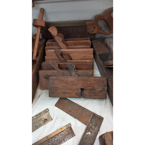 46 - A quantity of vintage carpenters planes etc