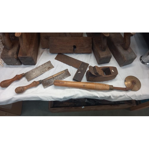 46 - A quantity of vintage carpenters planes etc