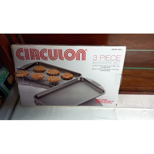 54 - An unused boxed Circulon 3 piece bakeware set, roasting tin and bread bin COLLECT ONLY