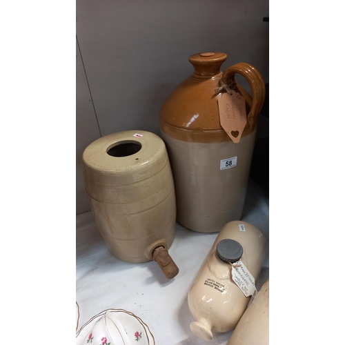 58 - A stoneware 2 gallon flagon, barrel with wooden tap and 2 foot warmers COLLECT ONLY