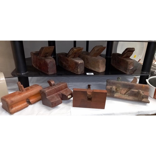 63 - A selection of old wooden carpenters planes