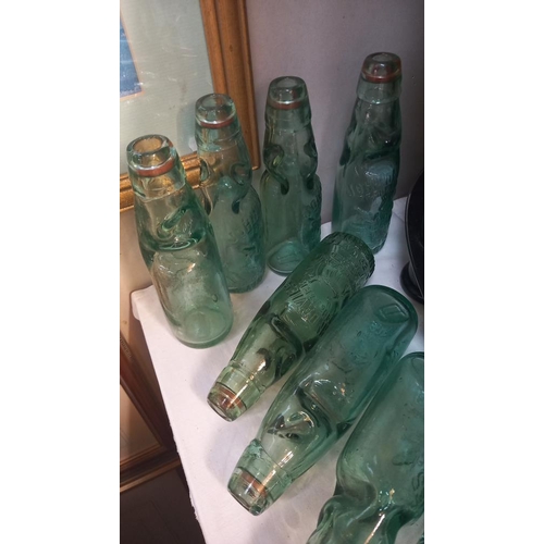 7 - A good selection of 19c/20c glass Gainsborough codd bottles