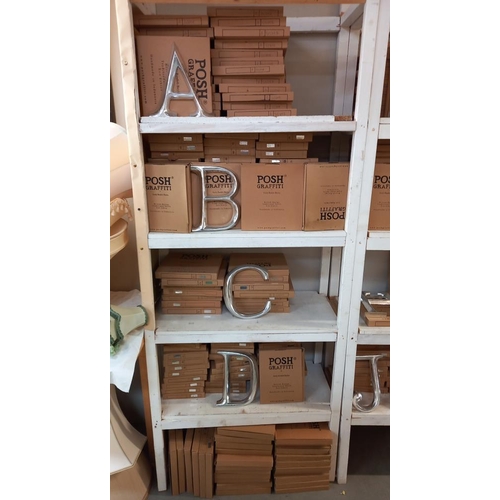 82 - A large quantity of wooden letters in silver from A through to Z COLLECT ONLY