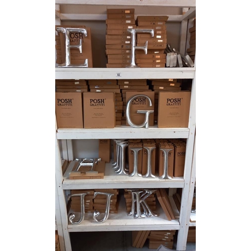 82 - A large quantity of wooden letters in silver from A through to Z COLLECT ONLY