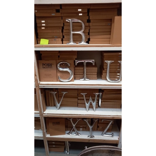 82 - A large quantity of wooden letters in silver from A through to Z COLLECT ONLY