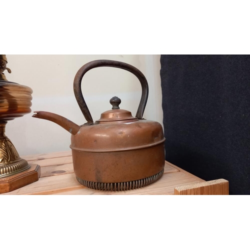 89 - 2 copper kettles and an oil lamp