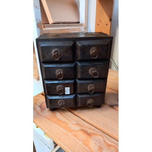 90 - A black spice chest, carved wooden vase etc