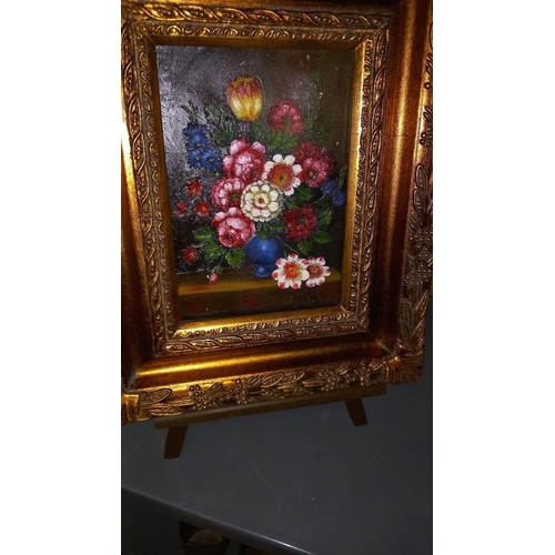 98 - A pair of ormalu gilt framed prints