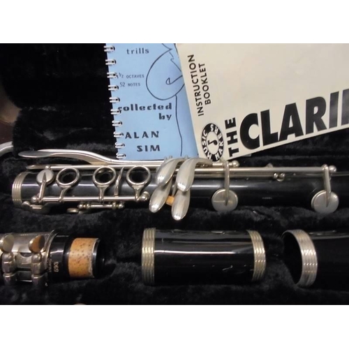 1325 - A cased Boosey and Hawkes clarinet.