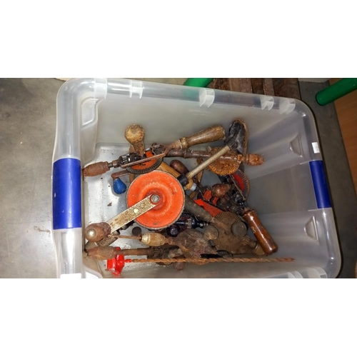 144 - A box of hand powered drills etc COLLECT ONLY