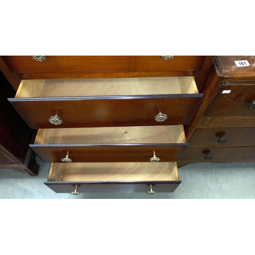 160 - A 1950's gents oak bedroom chest of drawers with lift up mirror backed lid COLLECT ONLY