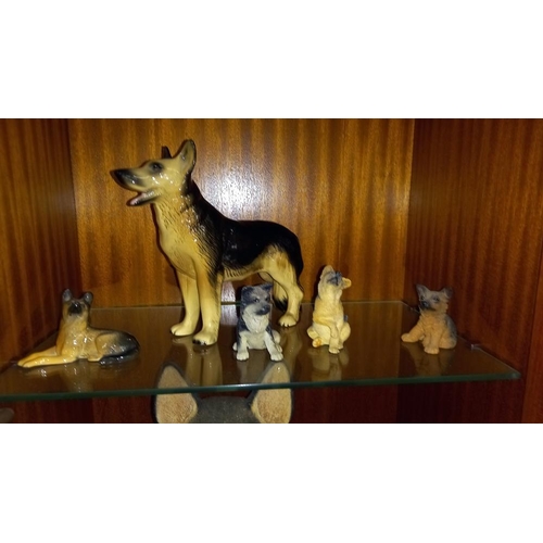 165 - 15 German Shepherd dog ornaments including Beswick, Border Fine Arts, a brass example etc COLLECT ON... 