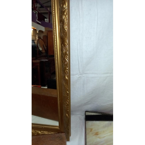 186 - A gilt framed mirror 60cm x 86cm COLLECT ONLY