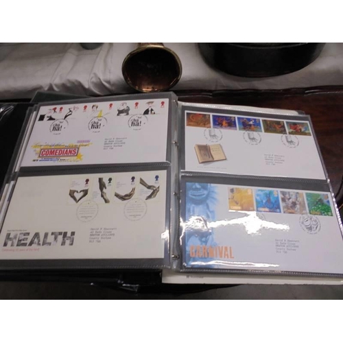 1355 - Two albums of assorted first day covers.