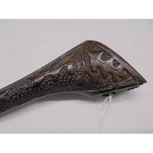 1169 - A carved wood clay pipe case, possibly Black Forest.