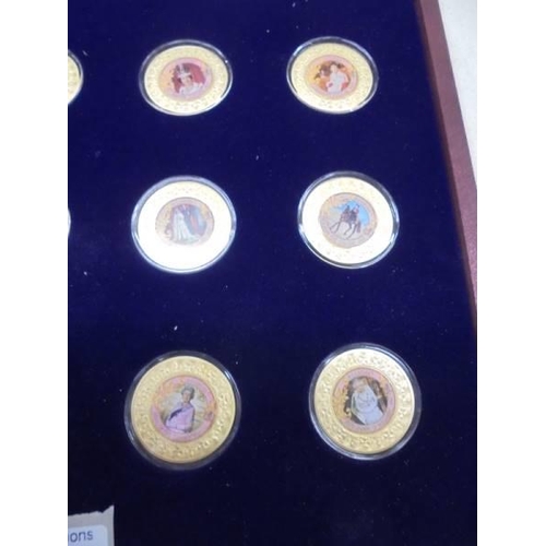 1173 - A cased set of twelve Historic Moments of Queen Elizabeth II reign and one other coin.