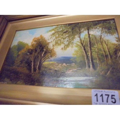 1175 - A gilt framed oil on board rural scene, signed but indistinct.