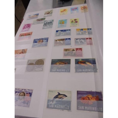 1225 - An album of assorted world stamps.