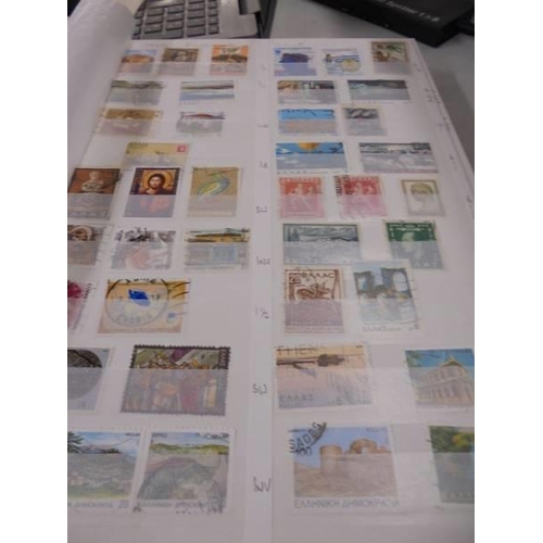 1225 - An album of assorted world stamps.