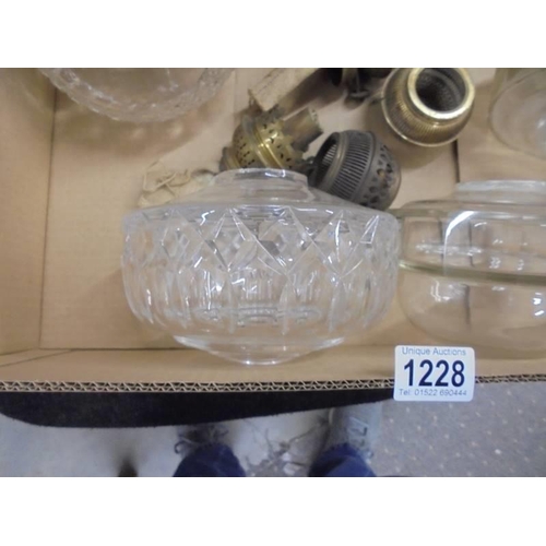 1228 - Four Victorian glass oil lamp fonts and burners. COLLECT ONLY.