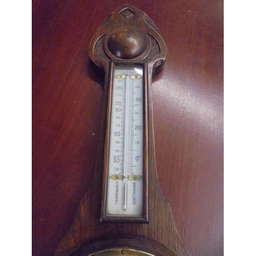 1373 - An oak barometer/thermometer.