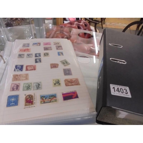 1403 - Two albums of world stamps.