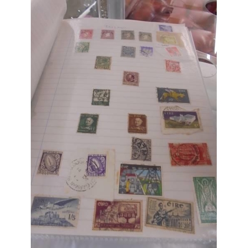 1403 - Two albums of world stamps.