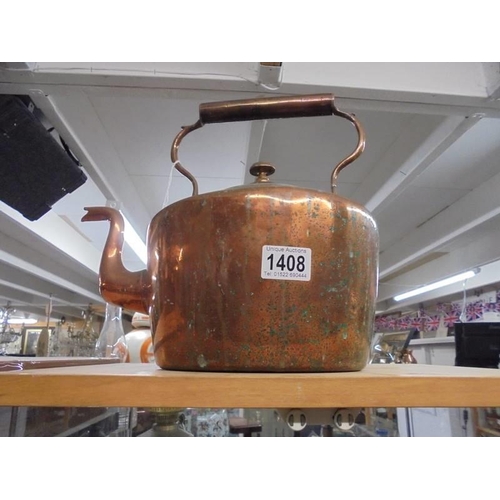 1408 - A large oval copper kettle.