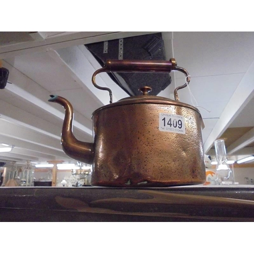 1409 - An oval copper kettle.