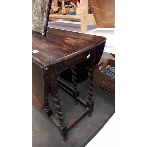 235 - A 1930's oak barley twist gateleg table COLLECT ONLY