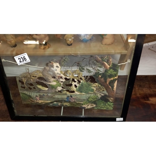 236 - A fine Victorian paper cut out behind glass