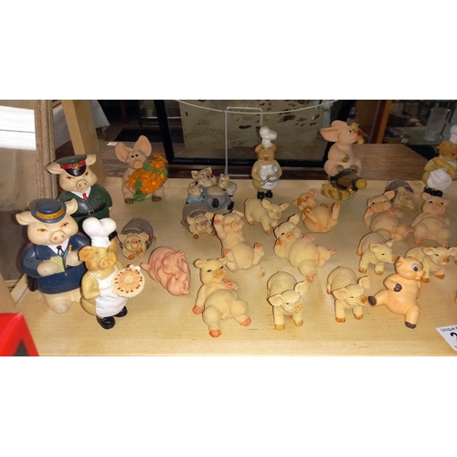 248 - A large quantity of pig  ornaments